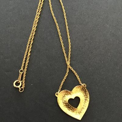 Beautiful gold tone necklace with heart enamel pendant