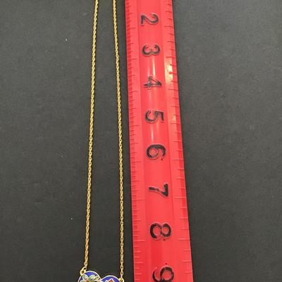 Beautiful gold tone necklace with heart enamel pendant