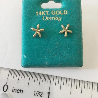 Cute 14 karat gold, overlay star, fish, stud earrings