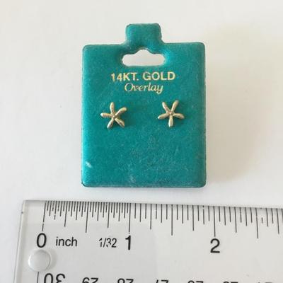 Cute 14 karat gold, overlay star, fish, stud earrings