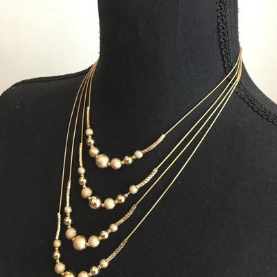 Beautiful 1946 gold toned layered necklace very beautiful