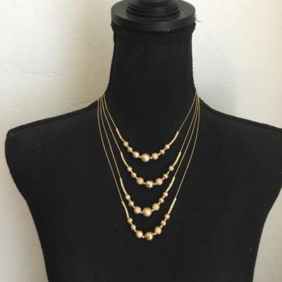 Beautiful 1946 gold toned layered necklace very beautiful