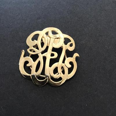 Gold toned scarf clip