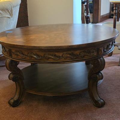 Birch finish round cocktail table