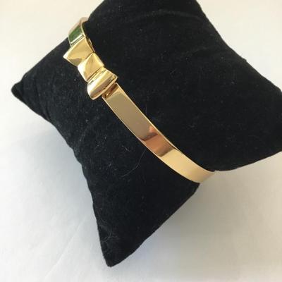 Cute Kate Spade ♠️ New York Bow gold tone, bangle bracelet