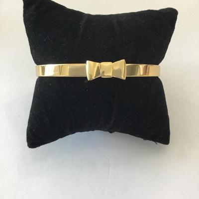 Cute Kate Spade ♠️ New York Bow gold tone, bangle bracelet