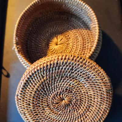 Sale Photo Thumbnail #646: Made with cane which is difficult to weave with, there is some sight aging of the cane.
It has very fine detail work, probably woven by a master basket weaver.  
Retail $75