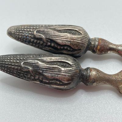 LOT 68: Monogrammed International Sterling S118 Salt and Pepper Shakers and Sterling Corn Cob Holders - TW 119.88g