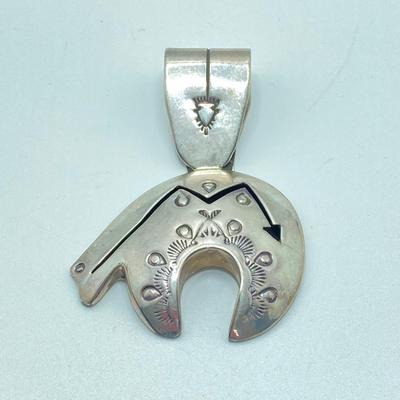 LOT 76: J Y Delgarito Sterling Navajo Lightening Bear Pendant and decorative Pierced Earrings