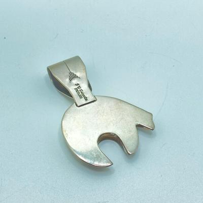 LOT 76: J Y Delgarito Sterling Navajo Lightening Bear Pendant and decorative Pierced Earrings