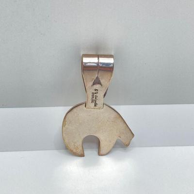 LOT 76: J Y Delgarito Sterling Navajo Lightening Bear Pendant and decorative Pierced Earrings