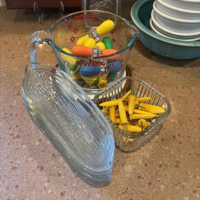 LOT 88: Fiesta Ware, Refrigerator Dishes, Corn on the Cob Dishes & Holders, Trivets, Quiche Dish w/Recipe
