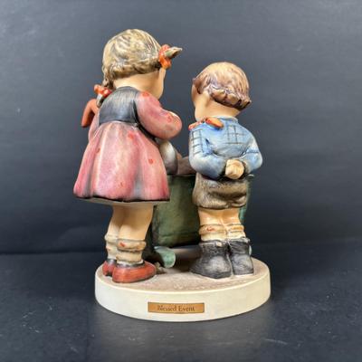 LOT 99: Set of 2 Hummels: Blessed Event & School Boy along with a Napco The Singer Figure