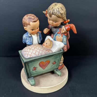 LOT 99: Set of 2 Hummels: Blessed Event & School Boy along with a Napco The Singer Figure