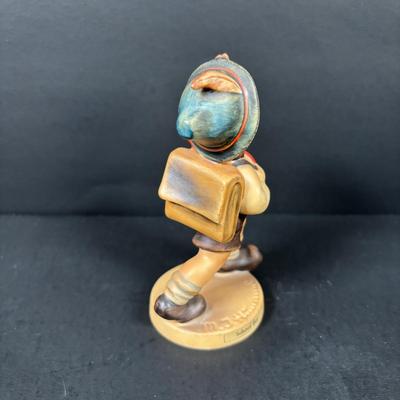 LOT 99: Set of 2 Hummels: Blessed Event & School Boy along with a Napco The Singer Figure