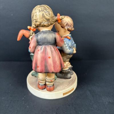 LOT 99: Set of 2 Hummels: Blessed Event & School Boy along with a Napco The Singer Figure