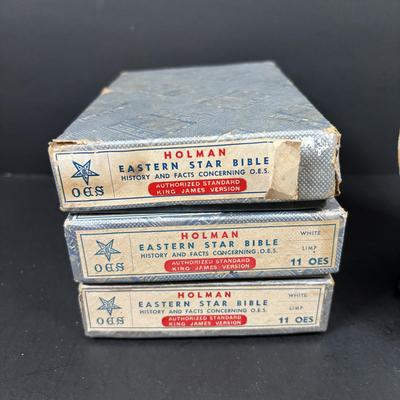 LOT 105: Eastern Star Bibles (3) in Original Boxes along with an Antique Bible Cover, Norcrest Eastern Star Teacup & More