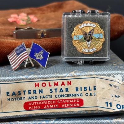 LOT 105: Eastern Star Bibles (3) in Original Boxes along with an Antique Bible Cover, Norcrest Eastern Star Teacup & More