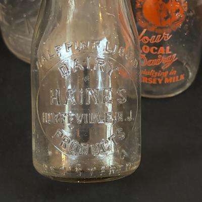 LOT 107: Vintage Milk Bottles: Haines, Jersey Local, McGills, MCM Carafes, Glass Double Boiler, Wooden Rolling Pin, Tin Recipes Boxes...