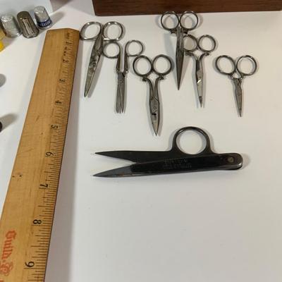 LOT 137: Collection of Vintage Sewing Notions Including Scissors, Thread, Thimbles, Pins, Needles and a Vintage Sears Electric Scissors...