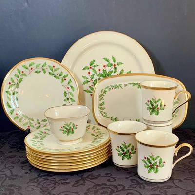 LOT 145. Collection of Lenox Holiday - Holy and Berry Patter Plates, Cups and More