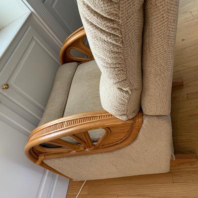 LOT 160: Ratan Rocker Recliner Chair