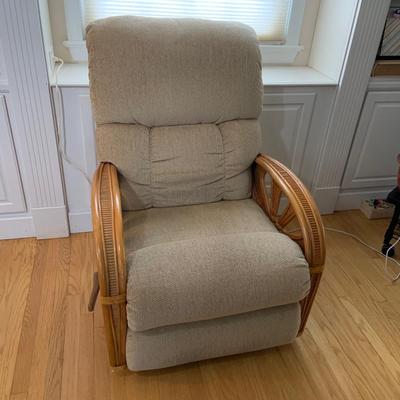 LOT 160: Ratan Rocker Recliner Chair