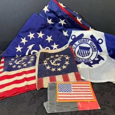 LOT 161: Collection of US Coast Guard and Yacht Flags and US Flag and Patch