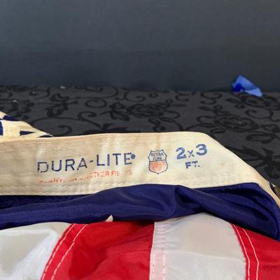 LOT 161: Collection of US Coast Guard and Yacht Flags and US Flag and Patch