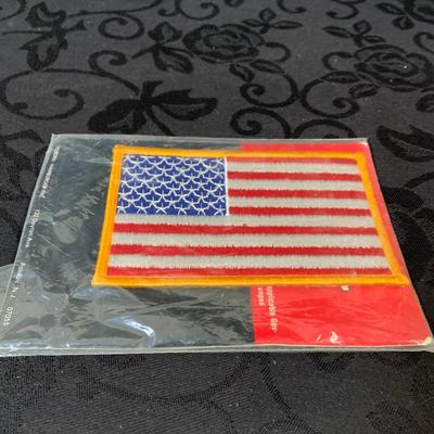LOT 161: Collection of US Coast Guard and Yacht Flags and US Flag and Patch