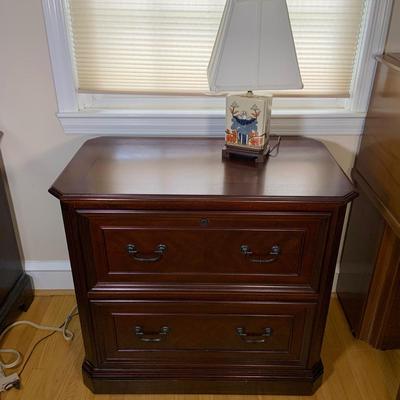 LOT 162: Wood Filing Cabinet with Two (2) Drawers Full of File Folders and a Asian Inspired Table Lamp