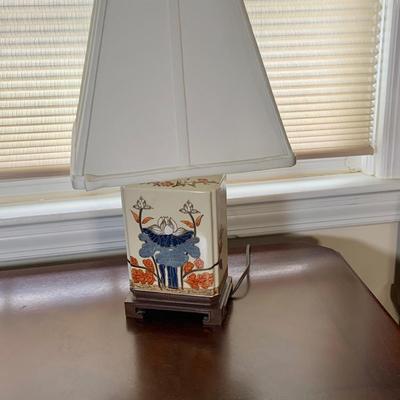 LOT 162: Wood Filing Cabinet with Two (2) Drawers Full of File Folders and a Asian Inspired Table Lamp