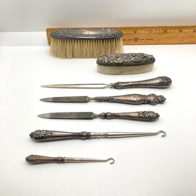 LOT 165: Vintage Sterling Handle Collection - Brush, Pumice Stone, Files, Hook Boot Lace Threaders and Letter Opener