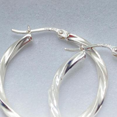 LOT 167: Collection of Sterling Pierced Earrings - Coldwater Creek Liquid Silver Dangle, Hoops and Loops Silver and Cubic Zirconia Styles
