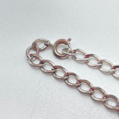 LOT 168: Sterling Jewelry Collection - Chain, Monogrammed Belt Buckle, Tie Tack, Vintage Charm Bracelet with Charms and More