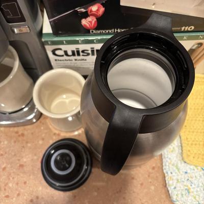 LOT 203: Kitchen Essentials: Keurig Model K10, Hot/Cold Carafe, Cuisinart Electric Knife, Chefs Choice Knife Sharpener & More