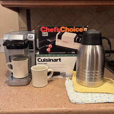 LOT 203: Kitchen Essentials: Keurig Model K10, Hot/Cold Carafe, Cuisinart Electric Knife, Chefs Choice Knife Sharpener & More