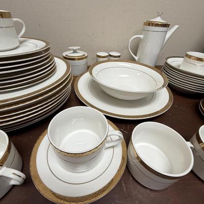 Sale Photo Thumbnail #195: In good condition with 1 piece chipped on underside.
8 dinner plates, 8 luncheon plates, 8 soup bows (1chipped on underside), 8 saucers, 8 cups, 1 coffee pot, 1 serving platter, 1 serving bowl, 1 sugar bowl (no creamer), 1 set of salt & pepper shakers.