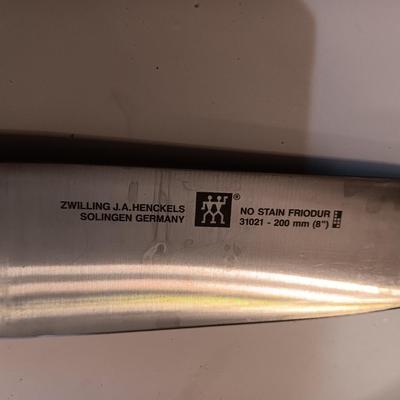 SET OF JA HENCKELS CUTLERY WITH SHARPENER