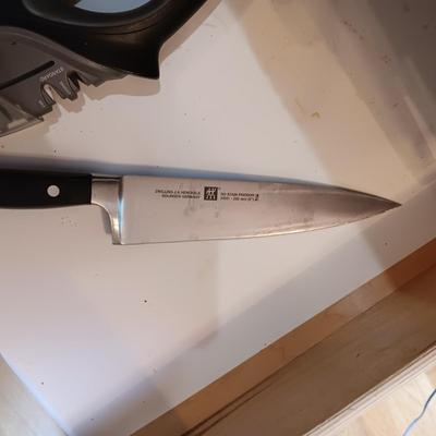 SET OF JA HENCKELS CUTLERY WITH SHARPENER
