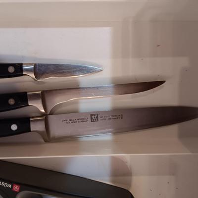 SET OF JA HENCKELS CUTLERY WITH SHARPENER
