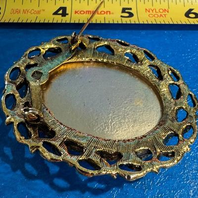 Vintage enamel and pearl bird brooch.