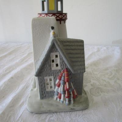 Sale Photo Thumbnail #395: Holds tea lights or candles, 10" tall x 9-1/4 long x 5" wide, see pictures