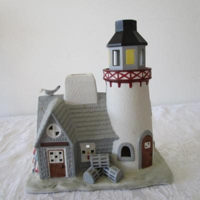 Sale Photo Thumbnail #392: Holds tea lights or candles, 10" tall x 9-1/4 long x 5" wide, see pictures