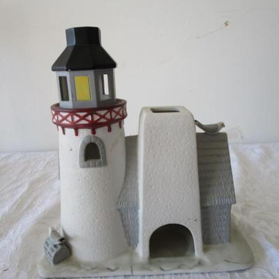 Sale Photo Thumbnail #393: Holds tea lights or candles, 10" tall x 9-1/4 long x 5" wide, see pictures