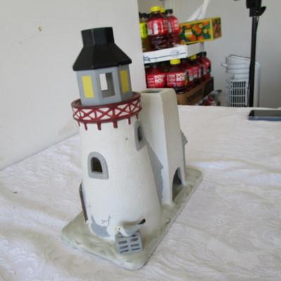 Sale Photo Thumbnail #394: Holds tea lights or candles, 10" tall x 9-1/4 long x 5" wide, see pictures