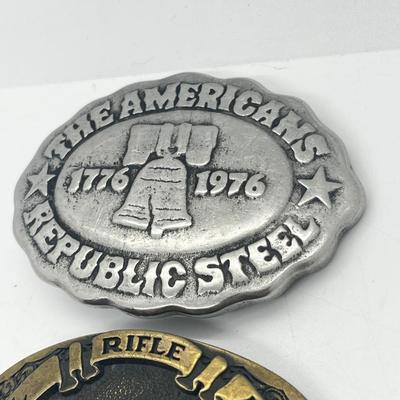LOT 79: Big and Heavy Vintage Belt Buckles - National Rifle Association and The Americans Republic Steel