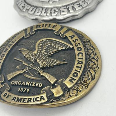 LOT 79: Big and Heavy Vintage Belt Buckles - National Rifle Association and The Americans Republic Steel
