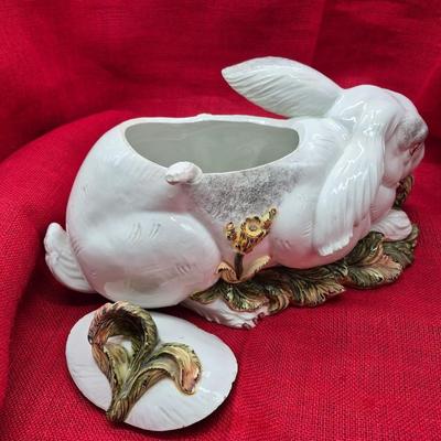 Sale Photo Thumbnail #650: Beautiful soup tureen with ladle, 18 inches x 9 inches tall.  There are a few slight chips
around the rim of the cover.  Marked Italy.  
Good condition.
Retail $300