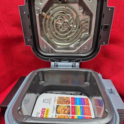 Sale Photo Thumbnail #656: Rapid Cooker & Air fryer with cookbook.
New